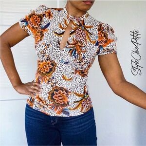 Free People Floral, Animal Print Keyhole Orange and Blue Top Size XS